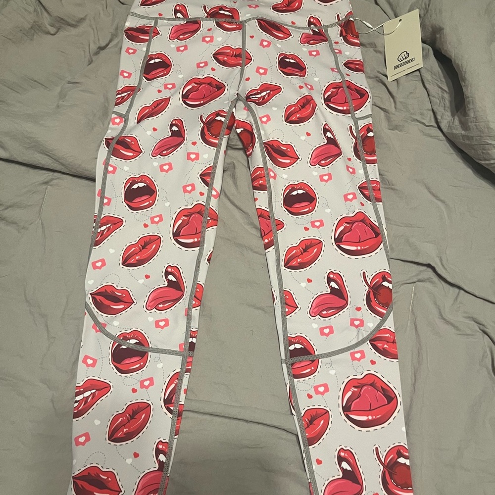 Brand new Feed Me Fight Me full length leggings